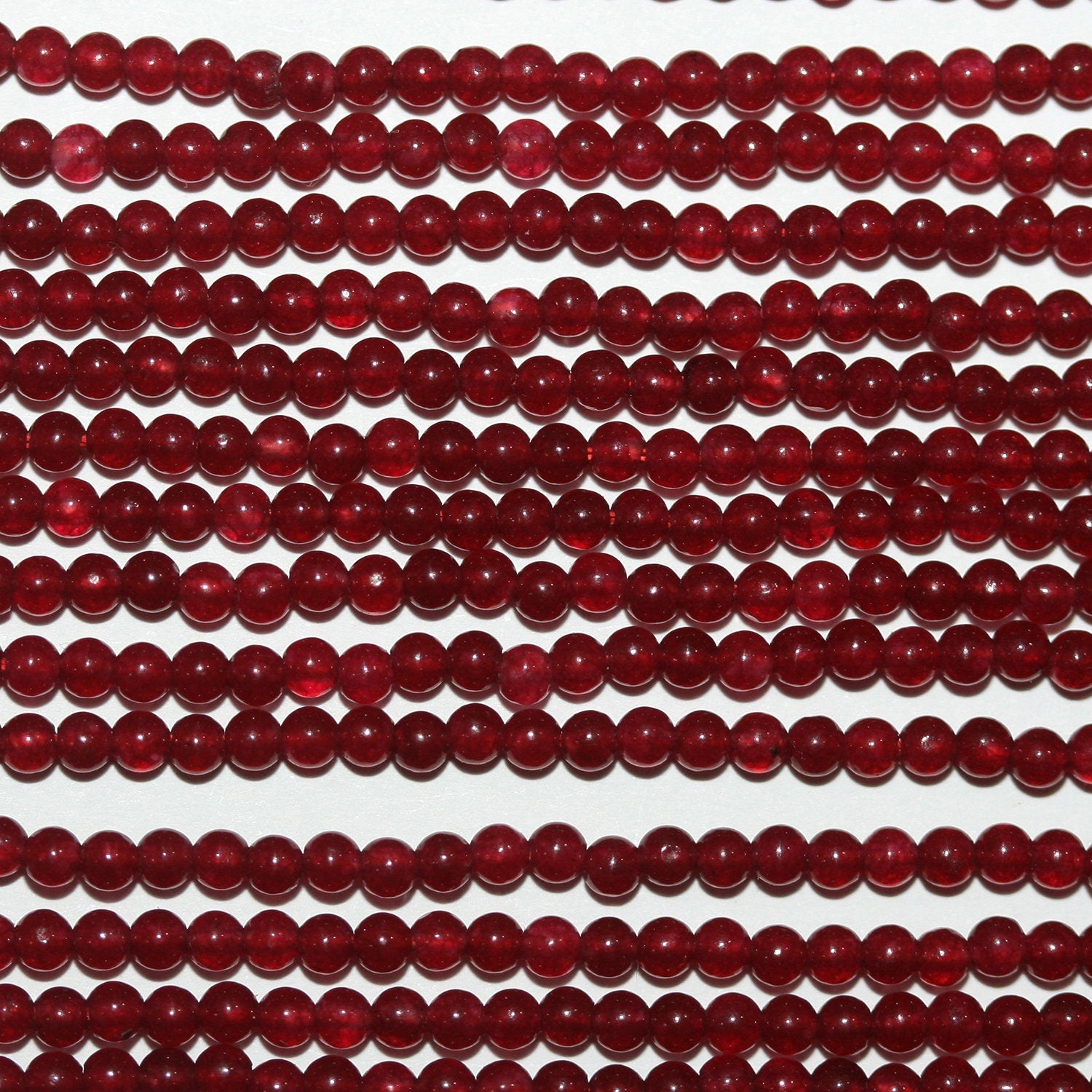 Perles rondes lisses en quartz rouge St 15" 2 mm.-Rig 39 cm.