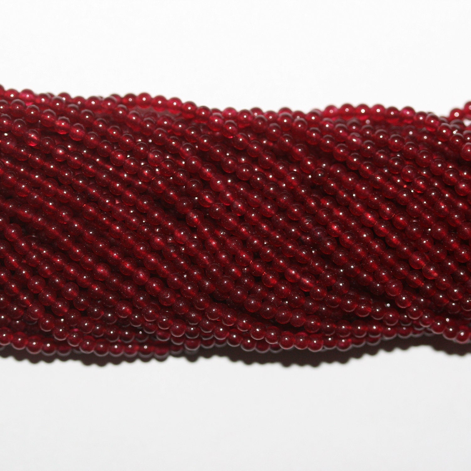 Perles rondes lisses en quartz rouge St 15" 2 mm.-Rig 39 cm.