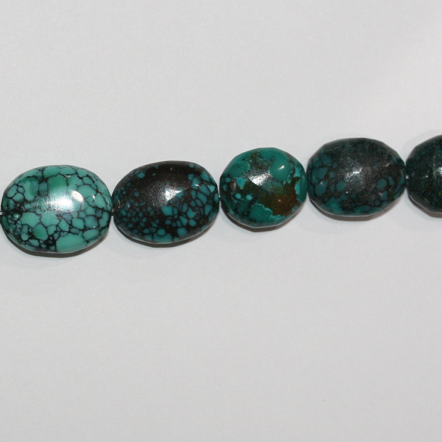 16" Cuentas Ovaladas Lisas Turquesa 16x14mm aprox.- Hilo 40cm.