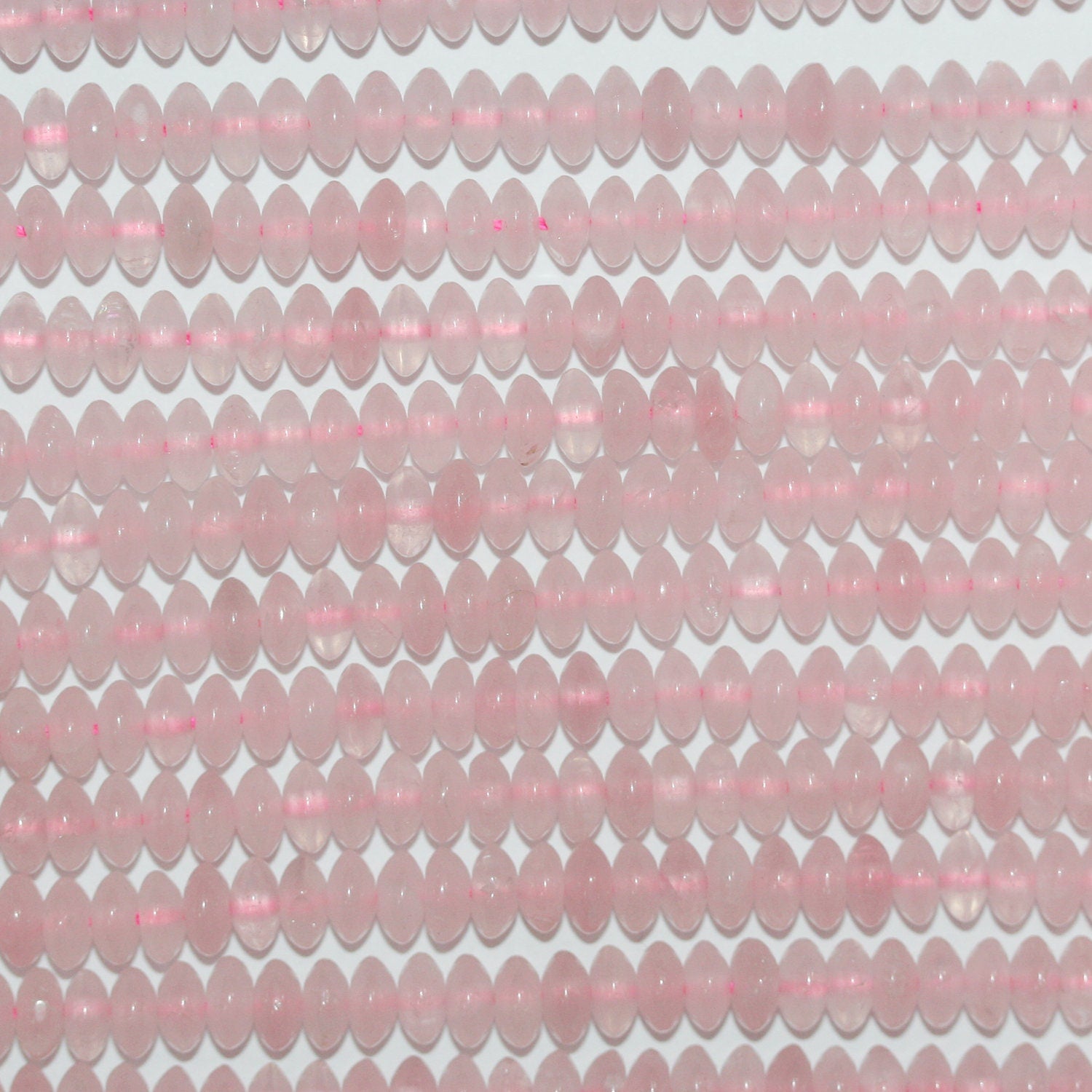 Perles rondelles lisses en quartz rose St 15" 6x3mm.- Brin 39cm.