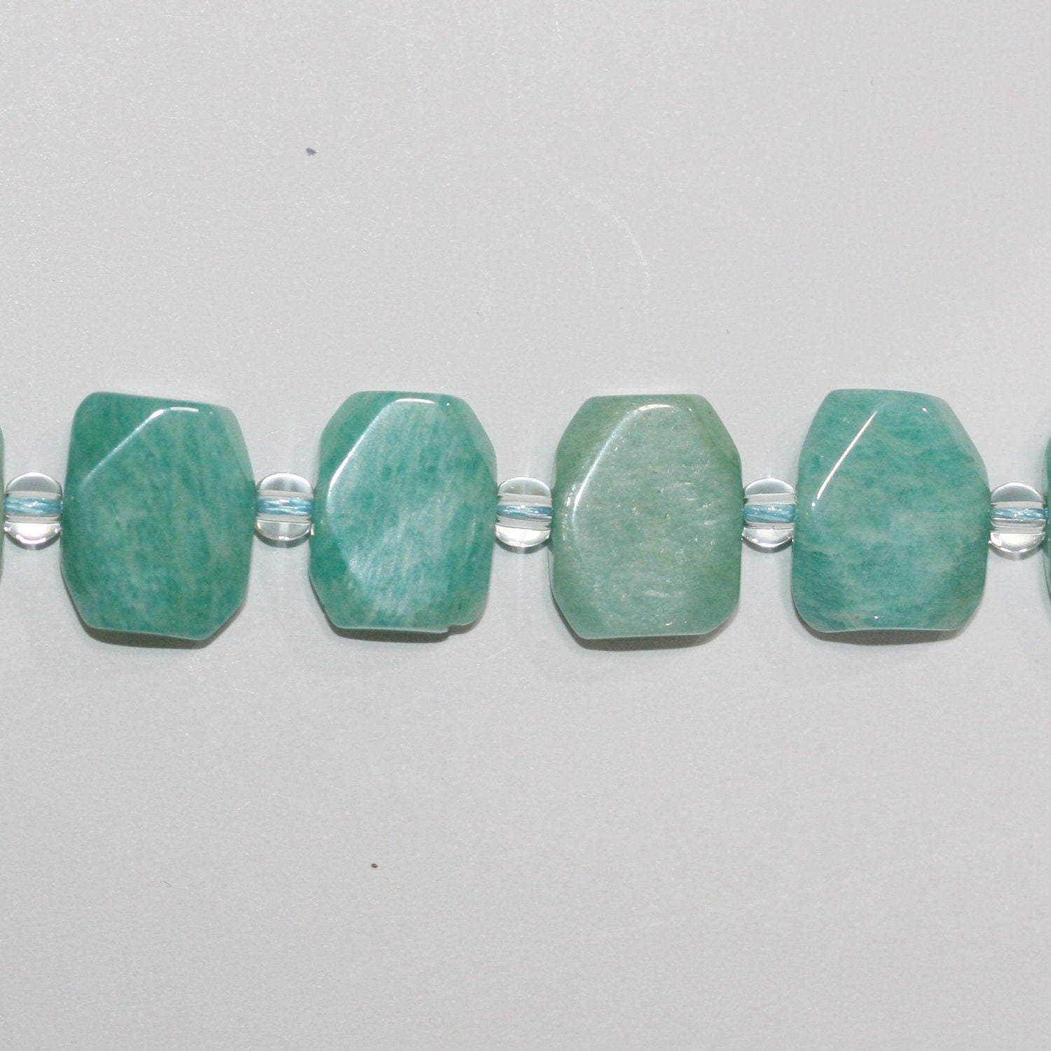 Perles ovales à facettes en amazonite St de 15 pouces, 13 x 17 mm environ - Longueur du fil : 39 cm.
