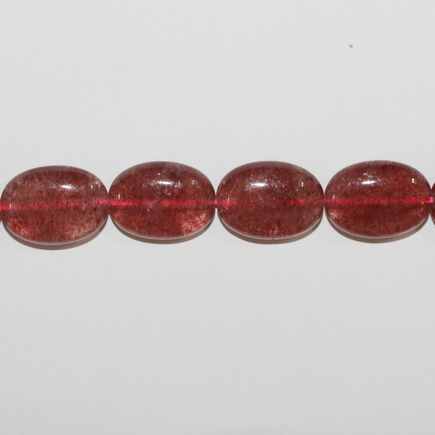 Perles ovales lisses en quartz St. Strawberry 15" 18x13mm.- Brin 39cm.