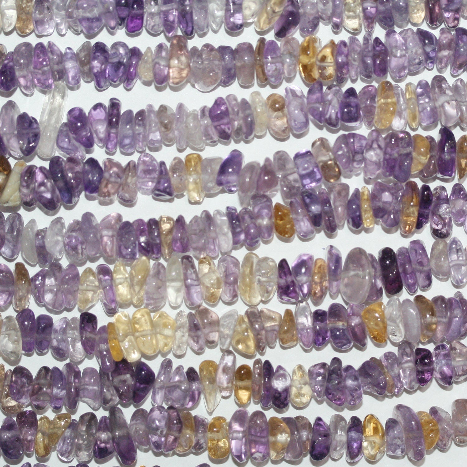 Perles de Sainte-Amétrine irrégulières et lisses de 15 pouces (environ 10 x 4 mm) - Longueur du fil : 39 cm.