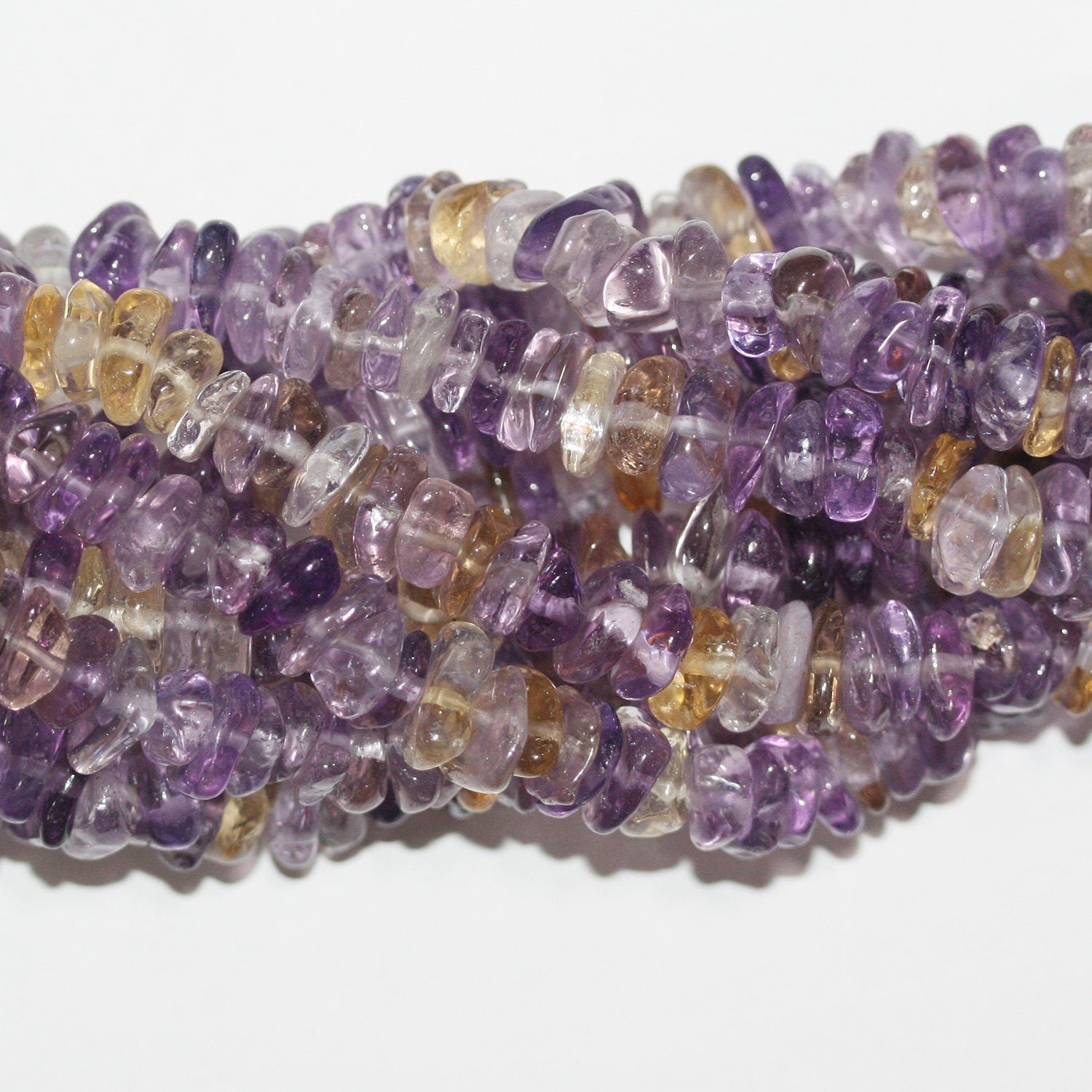 Perles de Sainte-Amétrine irrégulières et lisses de 15 pouces (environ 10 x 4 mm) - Longueur du fil : 39 cm.