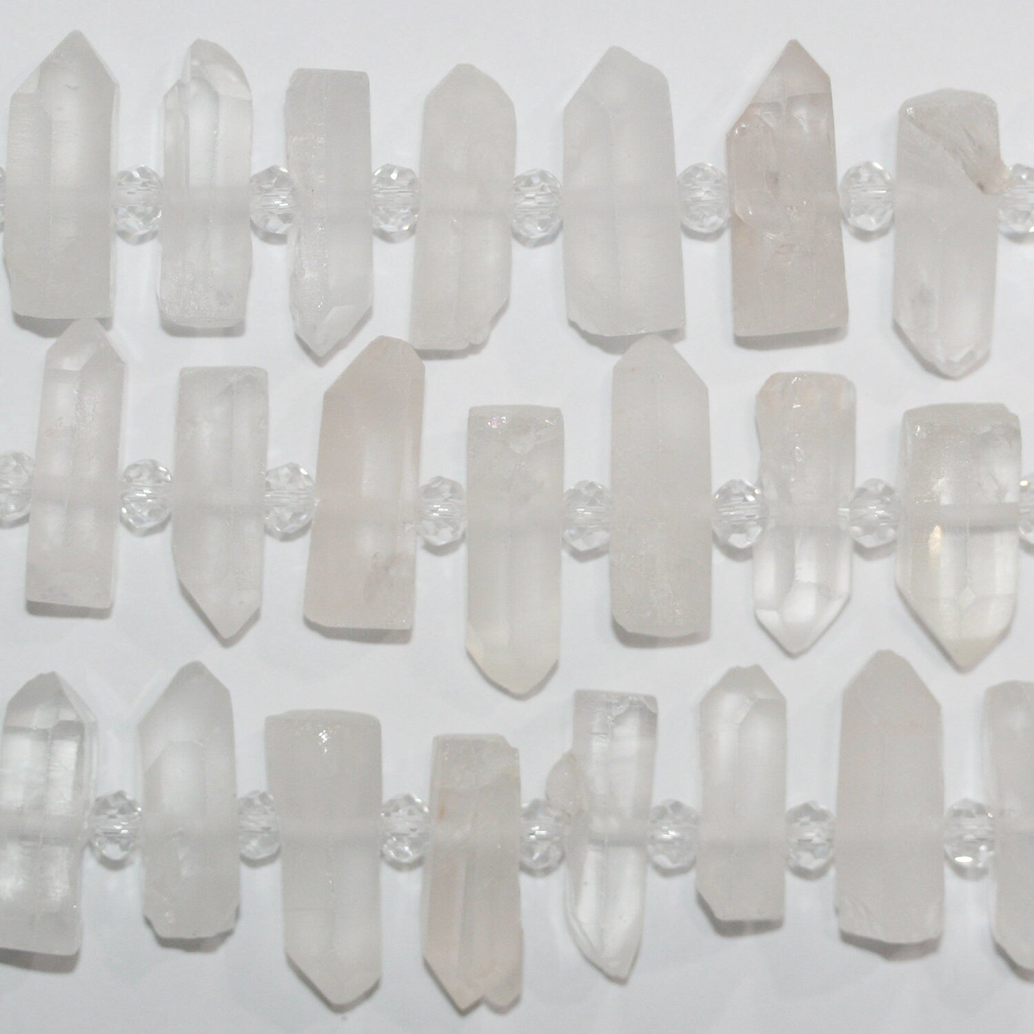 Perlas de cristal de roca de cuarzo de 16" con acabado mate sin pulir, 24 x 9 mm, aprox. - Hilo de 40 cm.