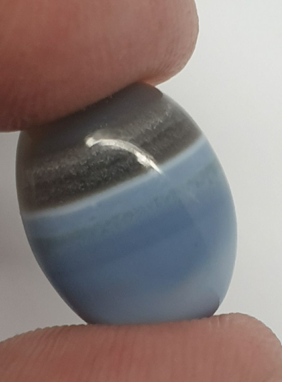 Natural Blue Stripe Opal Oval Cabochon 17x12.5mm.-(10.34ct)