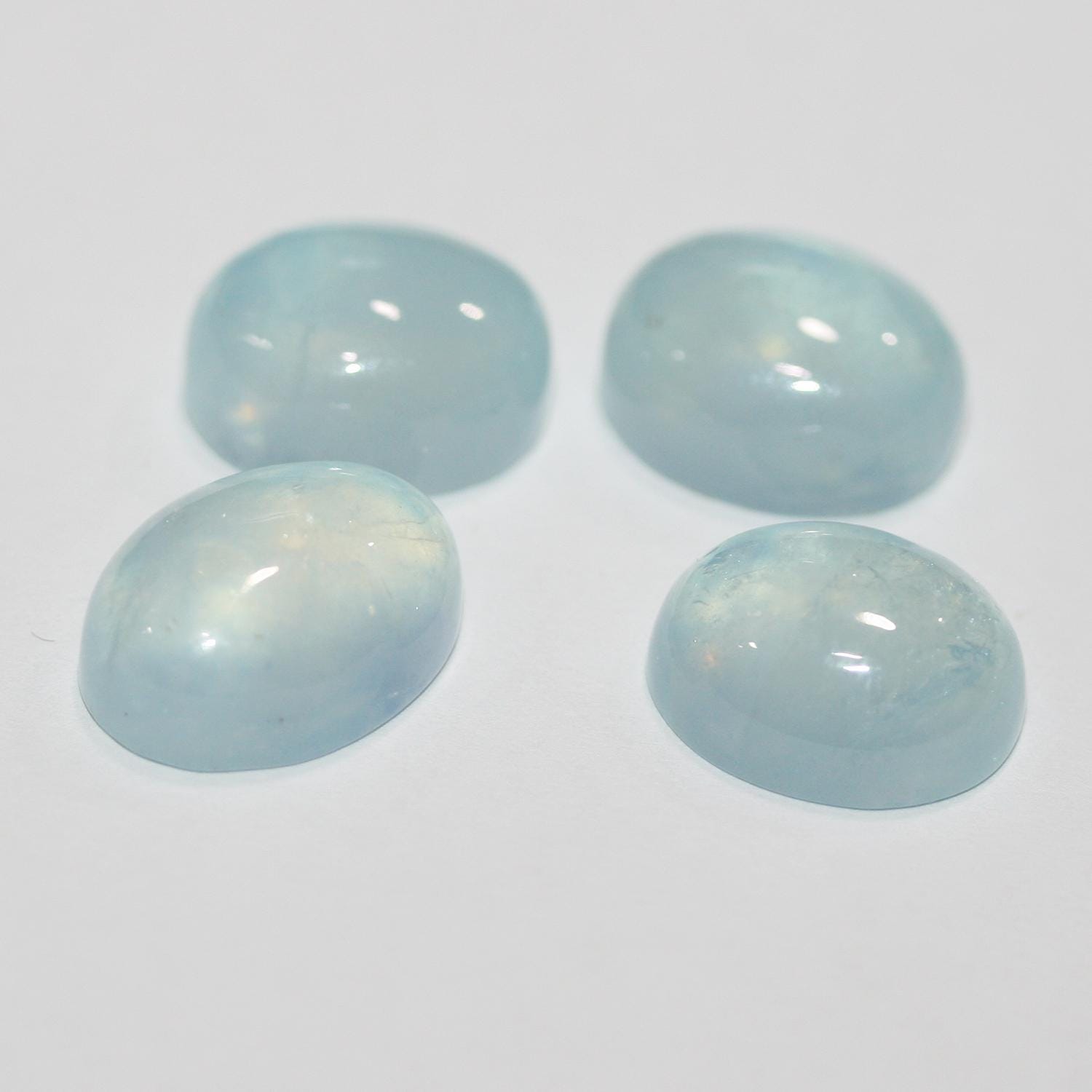 4Pcs Lot Aquamarine Oval Cabochon 16x12mm (4 pcs). - Hard Gems
