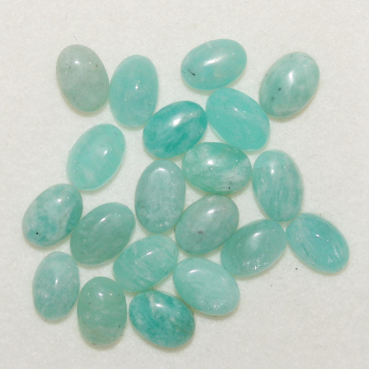 Lote de 20 cabujones ovalados lisos de amazonita de 6 x 4 mm (20 piezas)