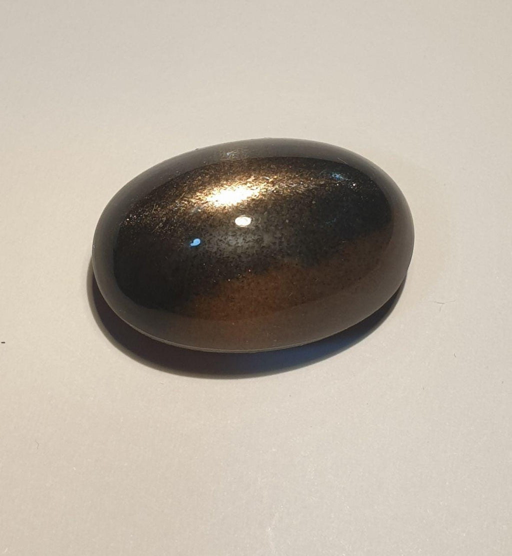 Cabochon ovale lisse en diopside étoilé noir, 23,4 x 15,8 mm (39,65 ct) - Astérisme parfait, qualité supérieure