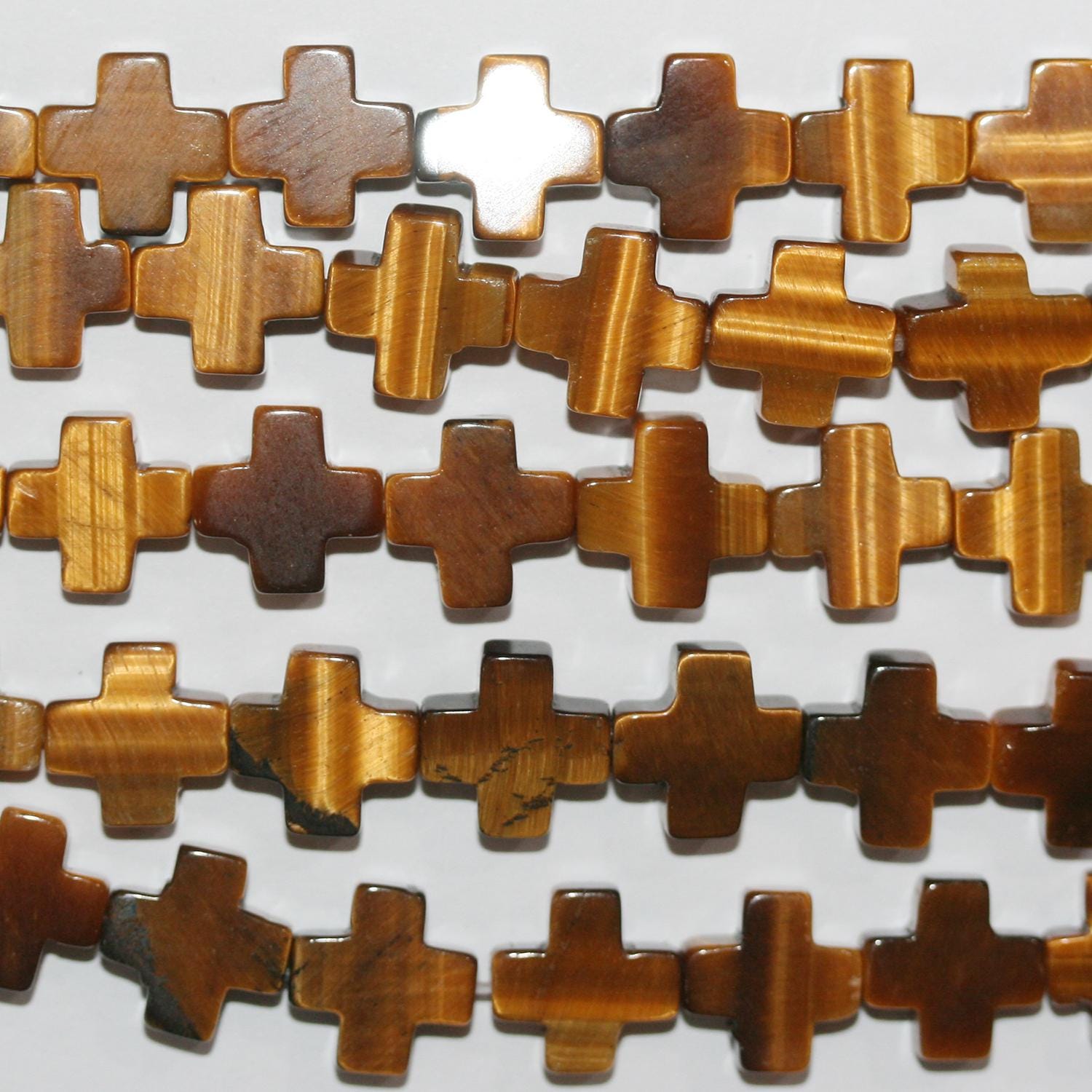 15" St Tiger Eye Smooth Cross Beads 10mm.-String 39cm.