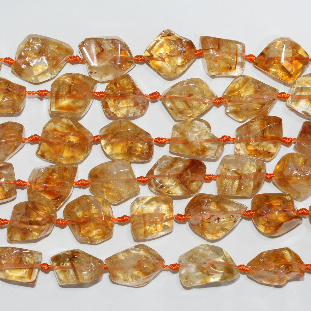 Perles de citrine facettées en forme de pépite de 15 pouces (16 x 12 mm). Longueur approximative du brin : 39 cm.