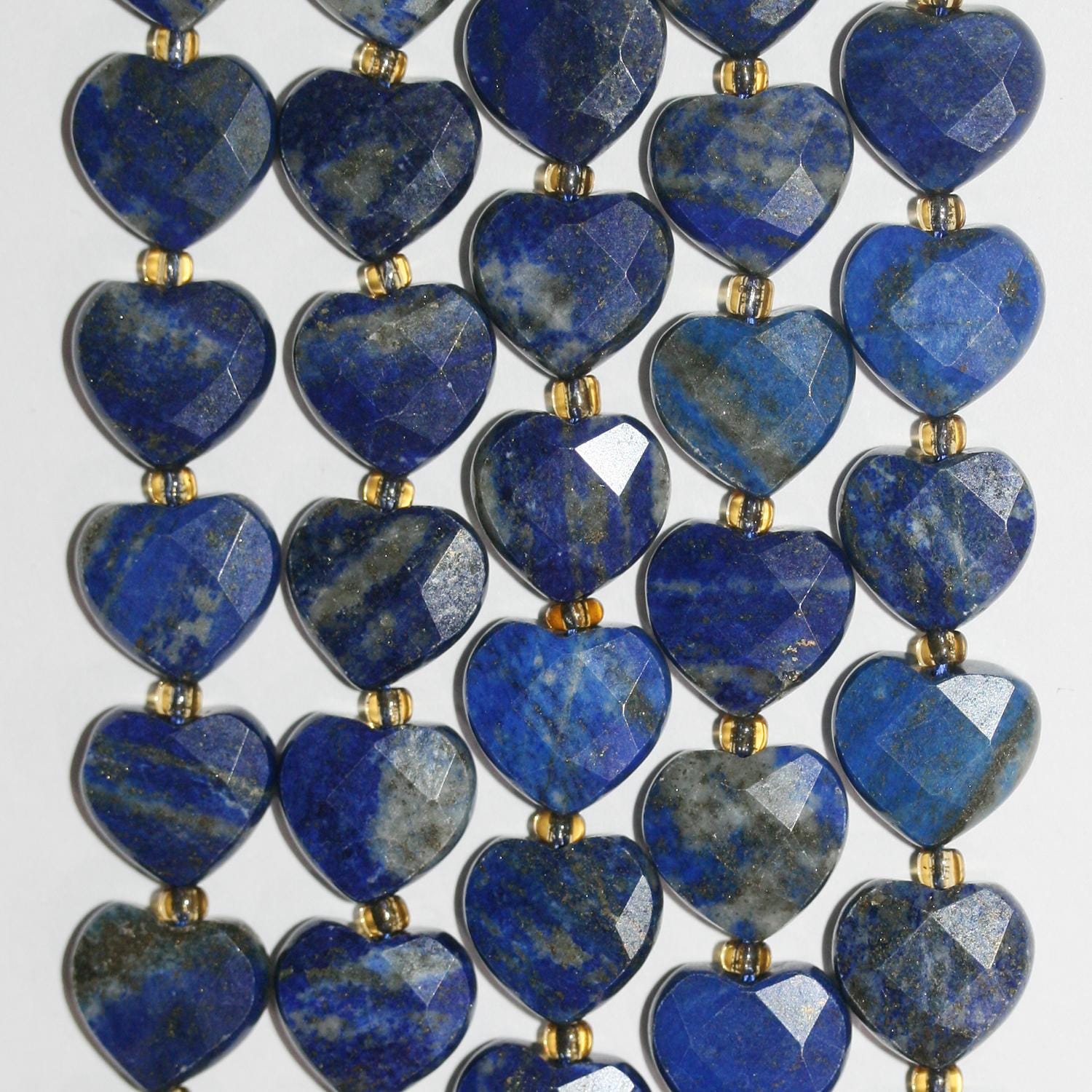 Cuentas de corazón facetadas de lapislázuli de 16" (11-12 mm) - Hilo de 39 cm