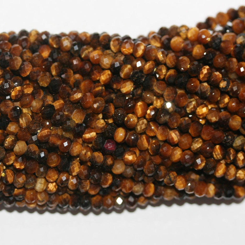 Perles rondelles à facettes œil de tigre St 15" 3x2mm- Brin 39cm.