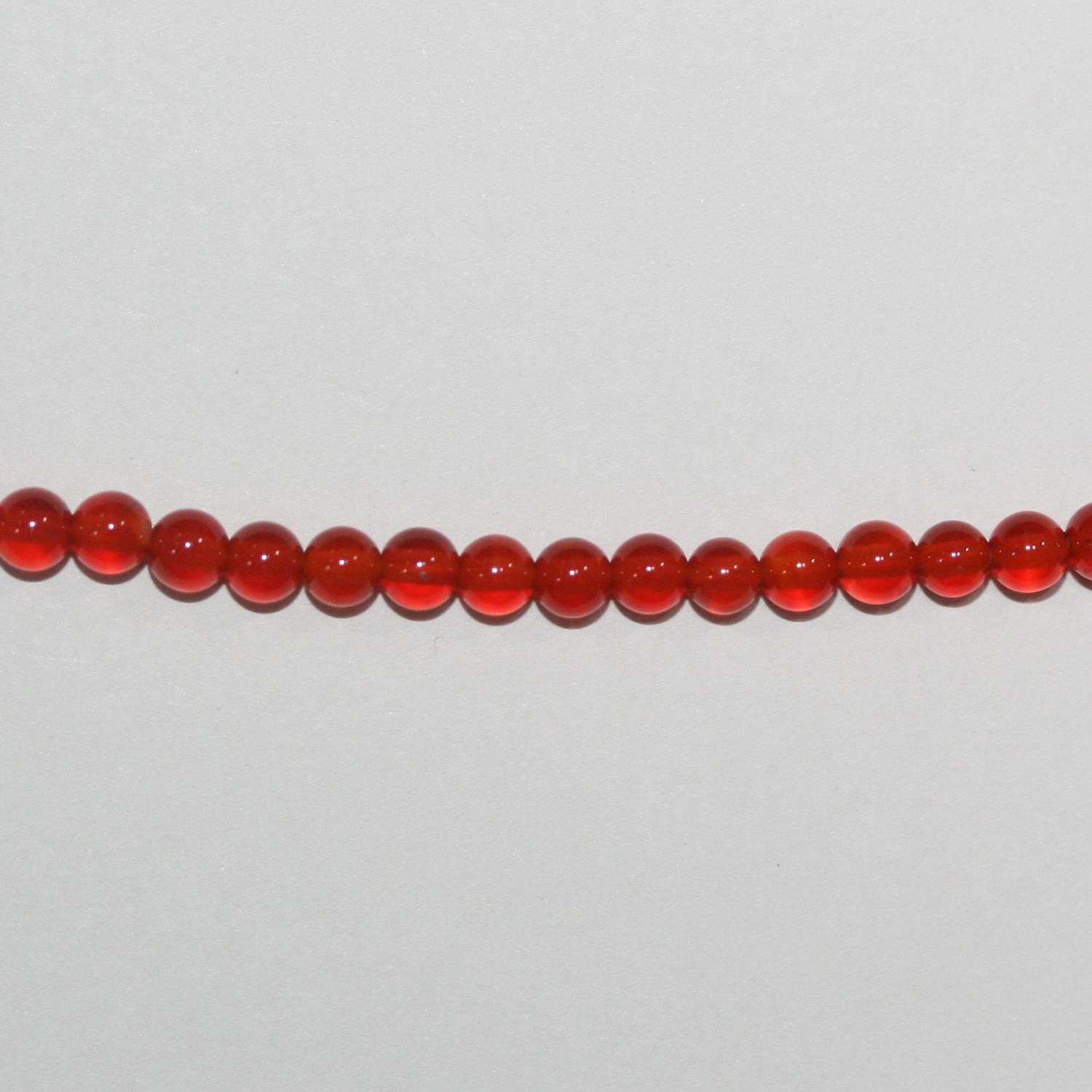 15" Perles rondes lisses en cornaline de 3 mm - Fil de 38 cm.