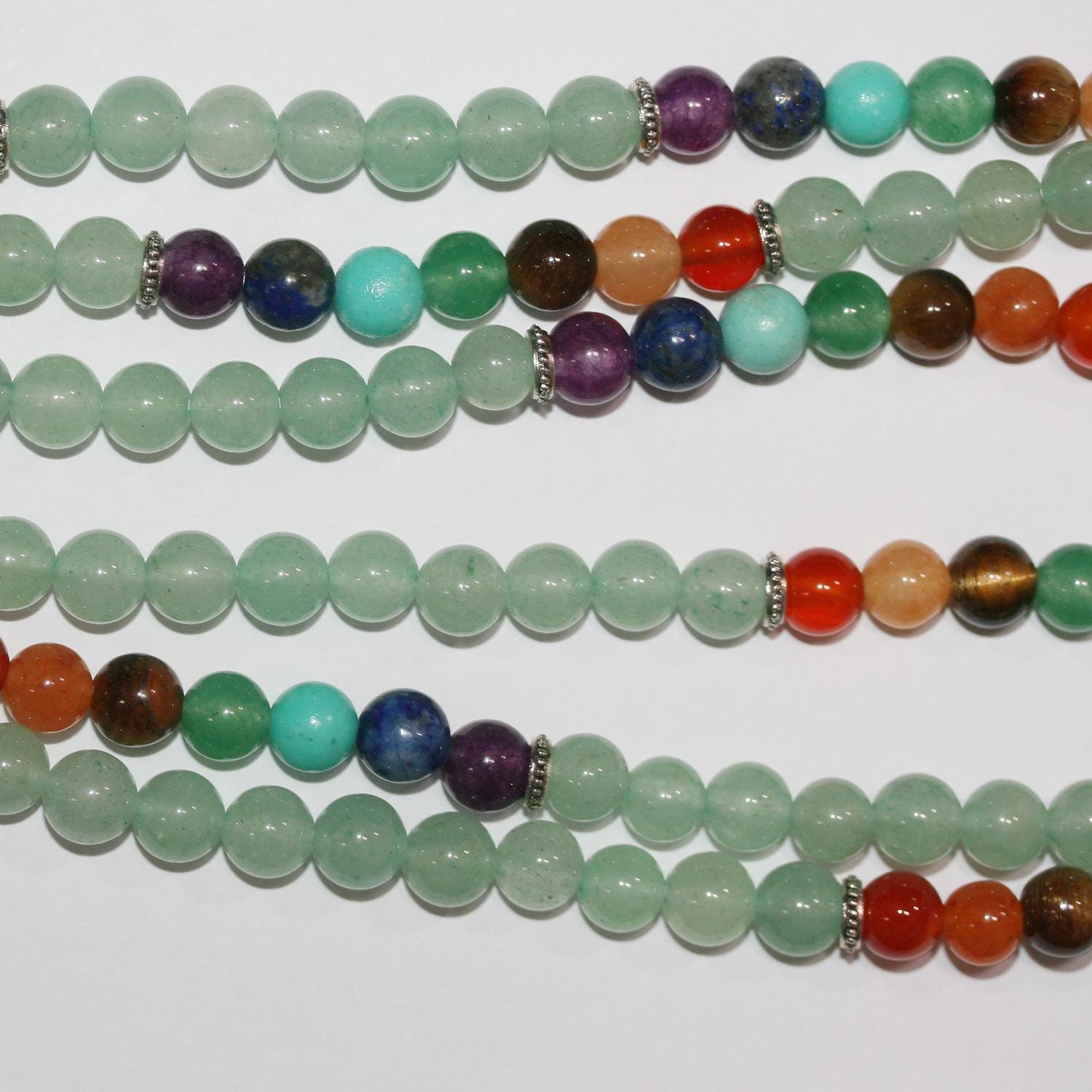 Mala multipiedra de 26", cuentas redondas lisas de 6 mm - hebra de 68 cm.