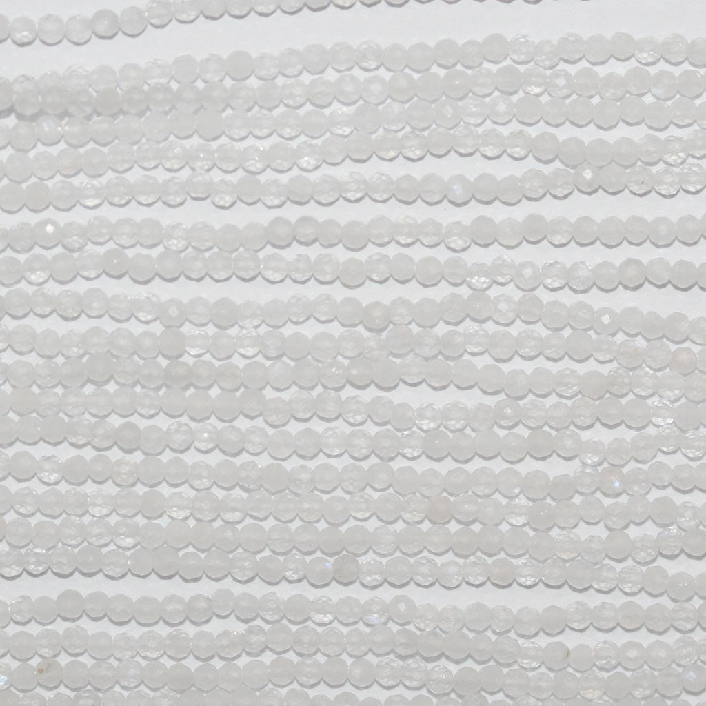 Perles rondes à facettes en pierre de lune St 15" 2 mm.- Brin 39 cm.