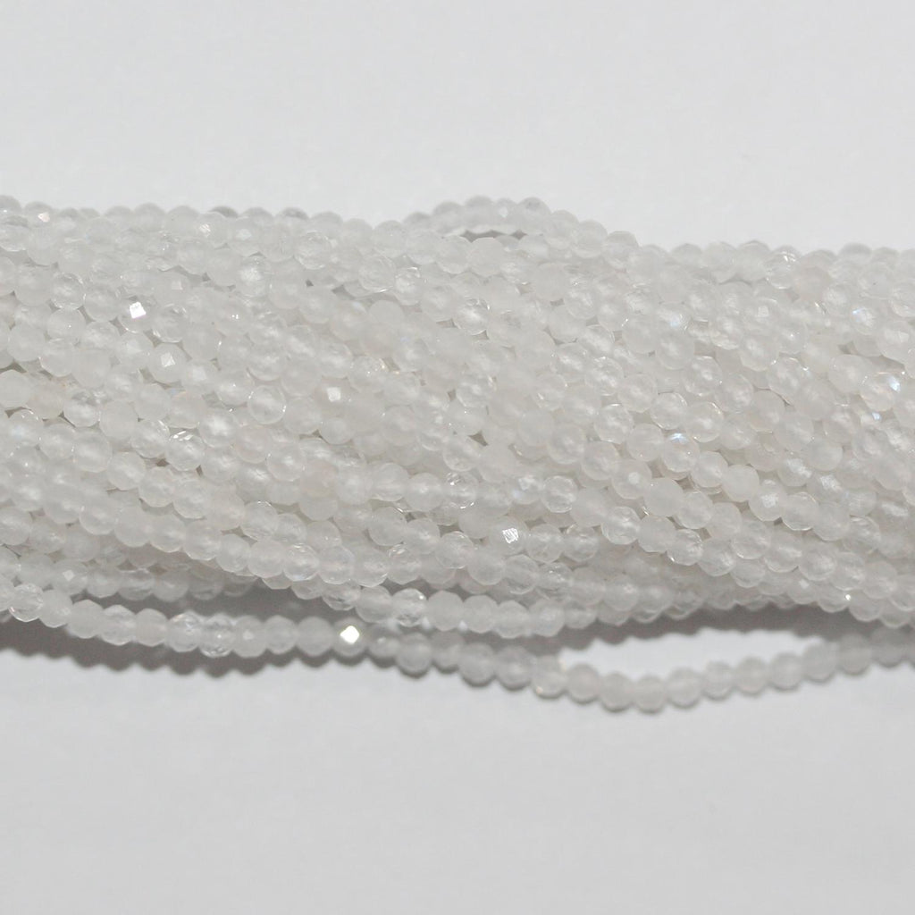 Perles rondes à facettes en pierre de lune St 15" 2 mm.- Brin 39 cm.