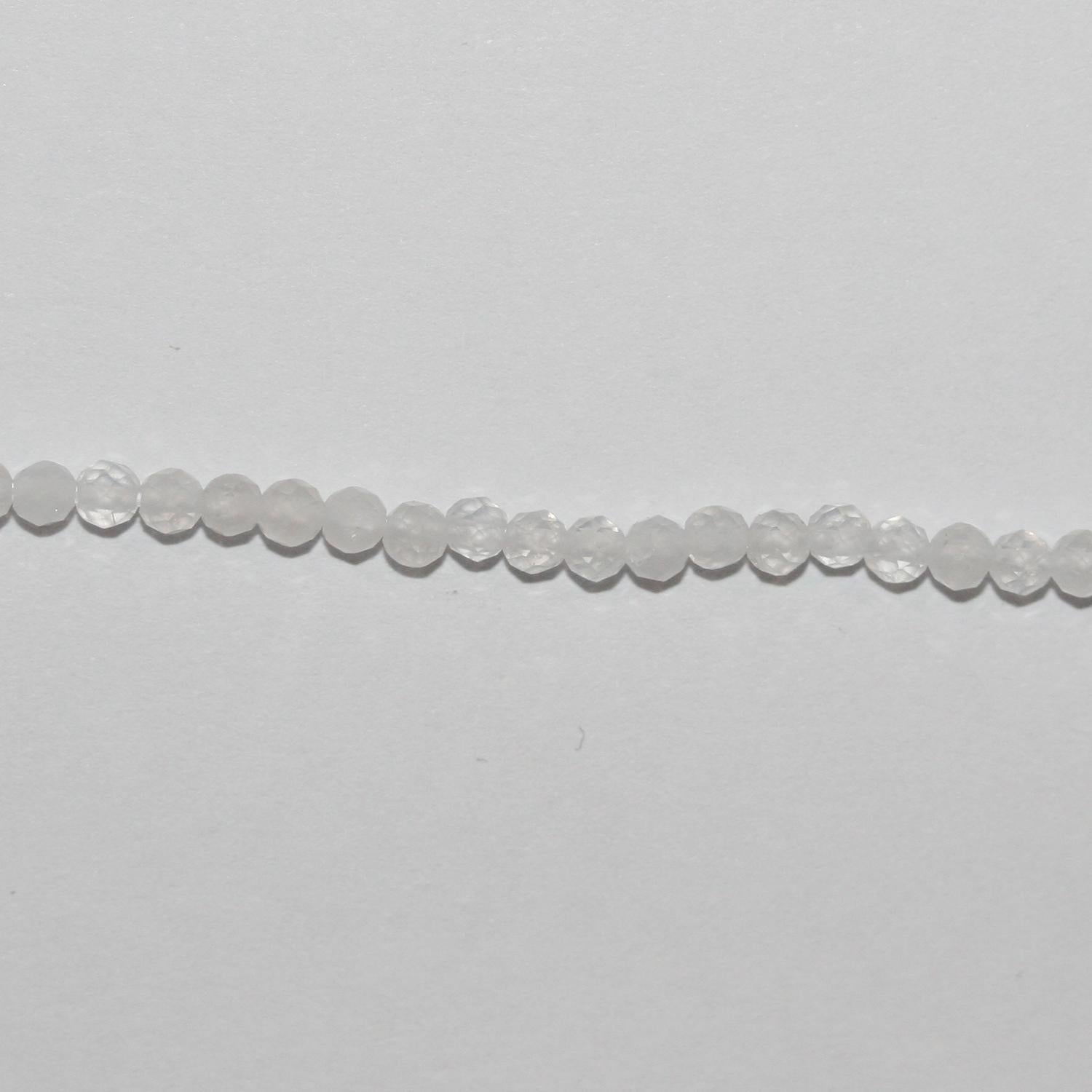 Perles rondes à facettes en pierre de lune St 15" 2 mm.- Brin 39 cm.