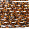 Perles rondelles à facettes œil de tigre St 15" 3x2mm- Brin 39cm.
