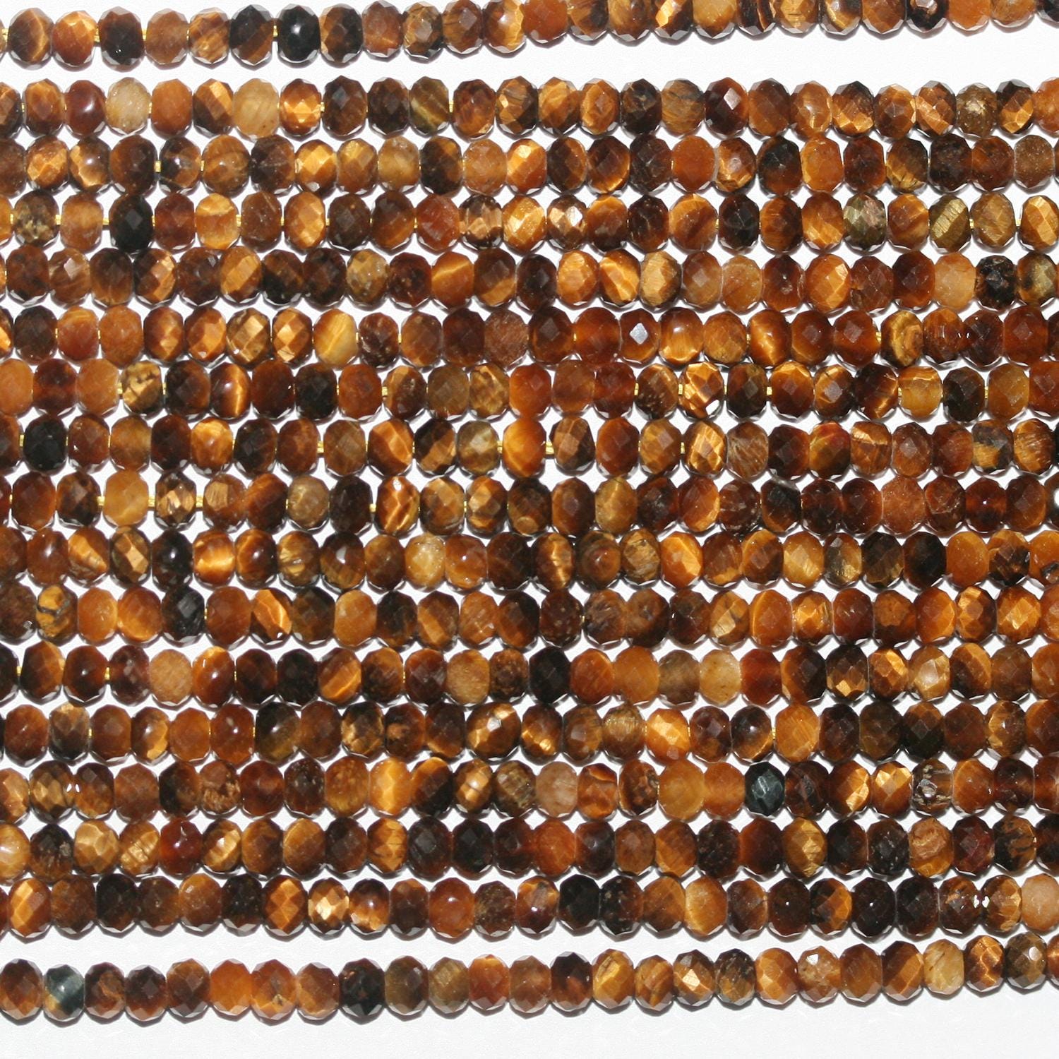 Perles rondelles à facettes œil de tigre St 15" 3x2mm- Brin 39cm.