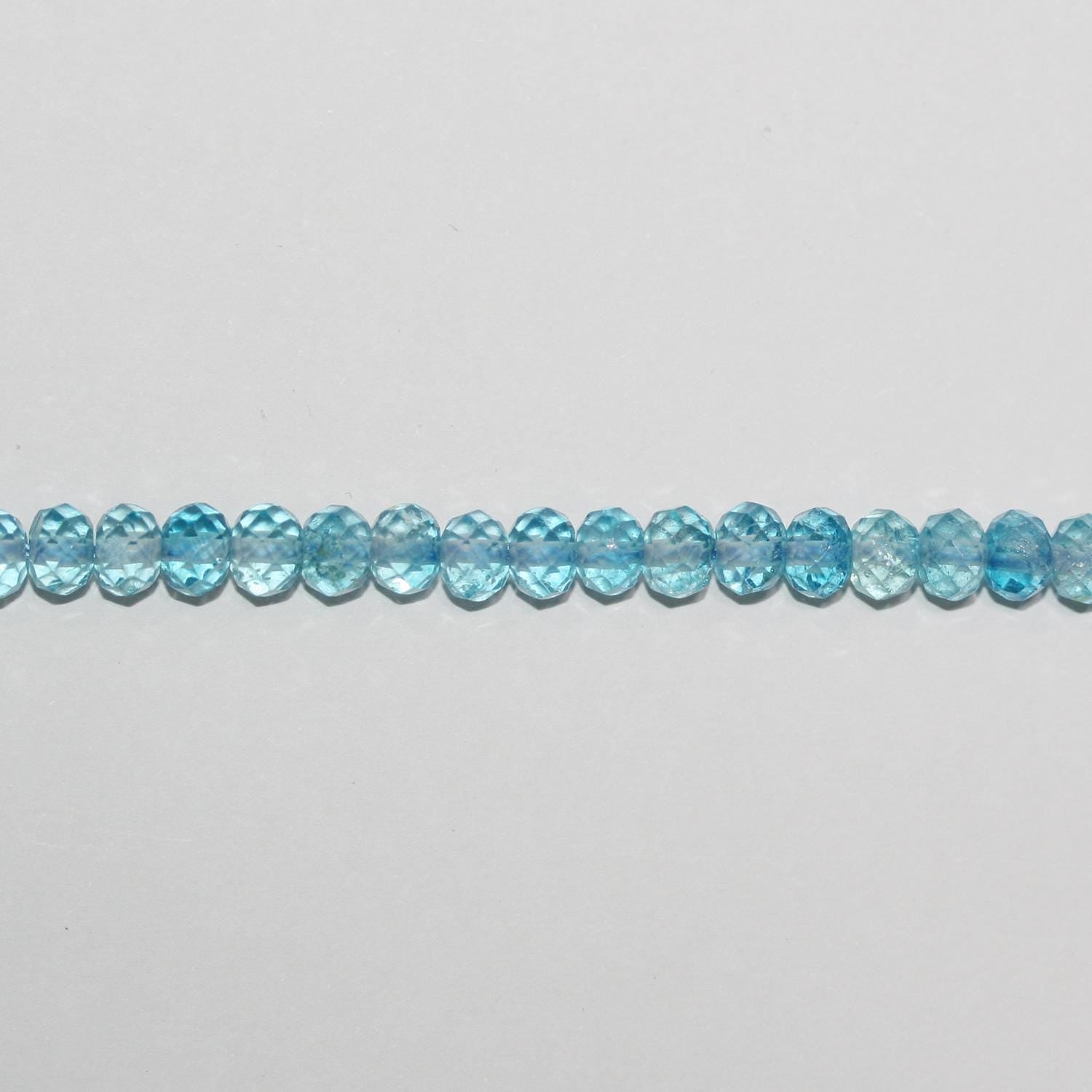 Cuentas redondas facetadas de topacio azul de 16" (6 x 4 mm) - Hilo de 39 cm