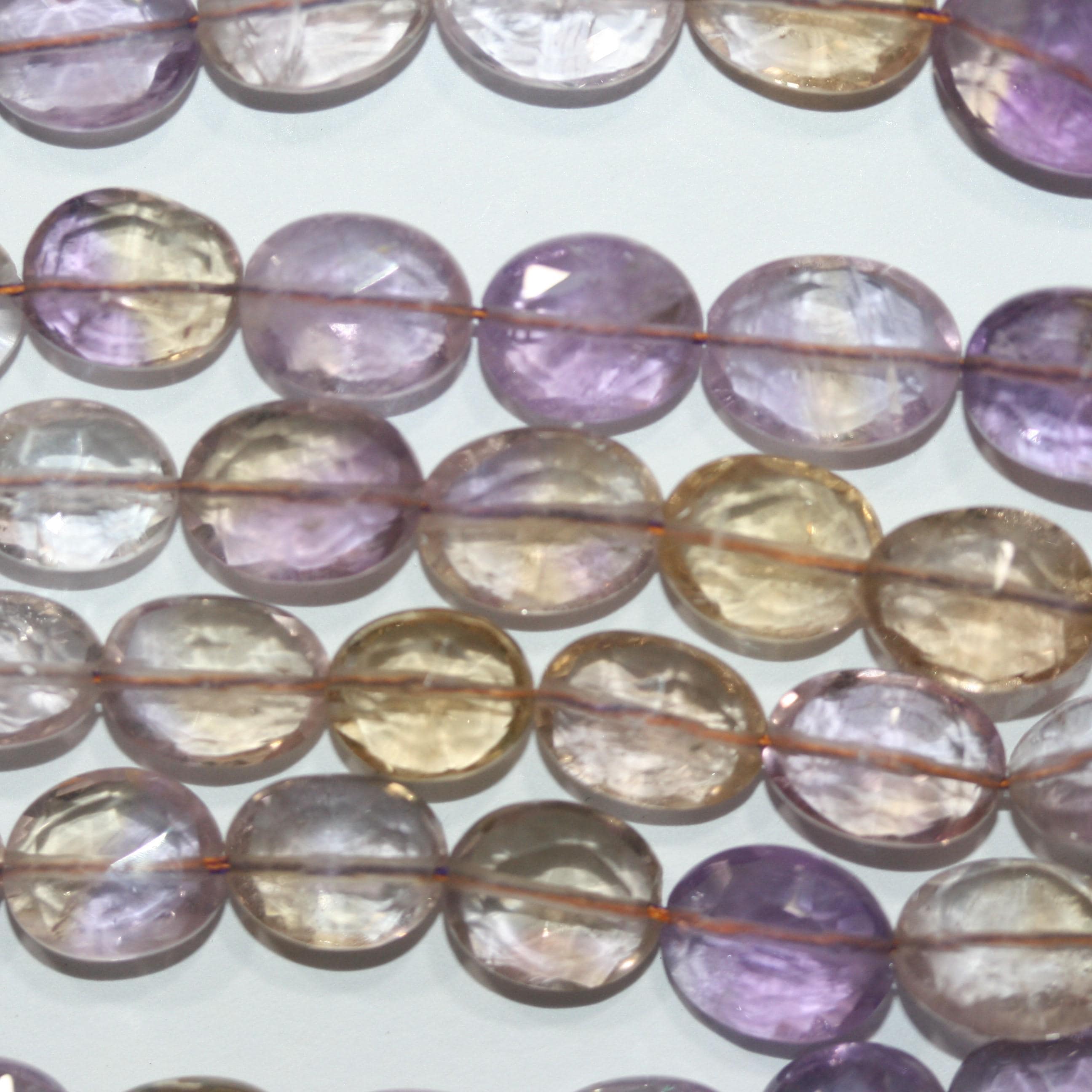 Cuentas de amatista facetadas ovaladas graduadas de 16" (11 x 9 x 6 x 5 mm) - Hilo de 40 cm - Artículo 15052