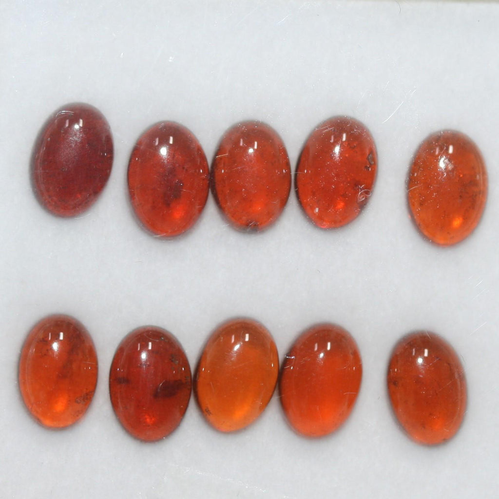 Hessonite Garnet Smooth Oval Cabochon 7x5mm. (10 Pcs).- Item.1755CB