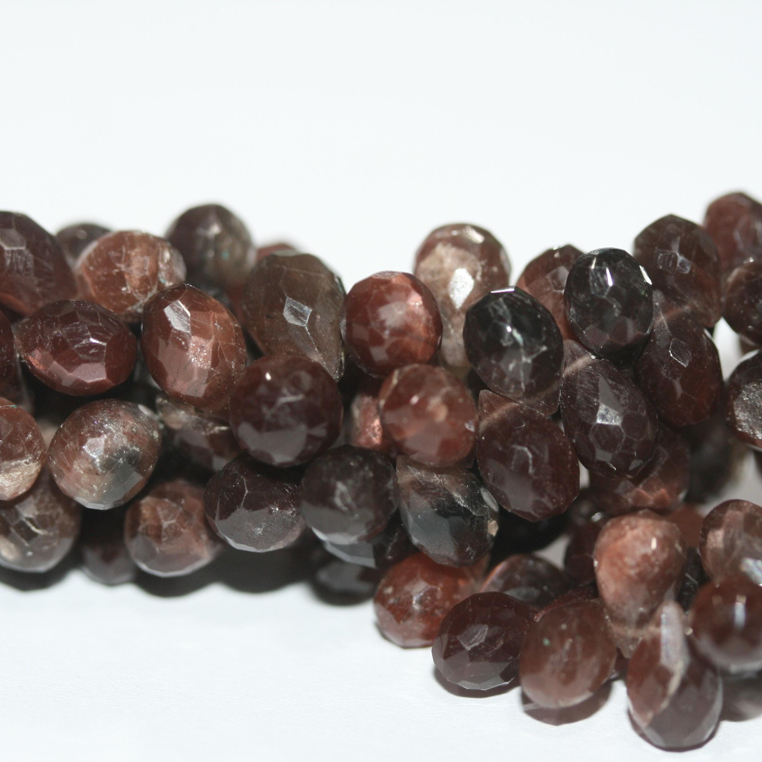 Cuentas de piedra lunar marrón facetadas de 8" (9 x 6 mm). Aprox. - Hilo de 20 cm.