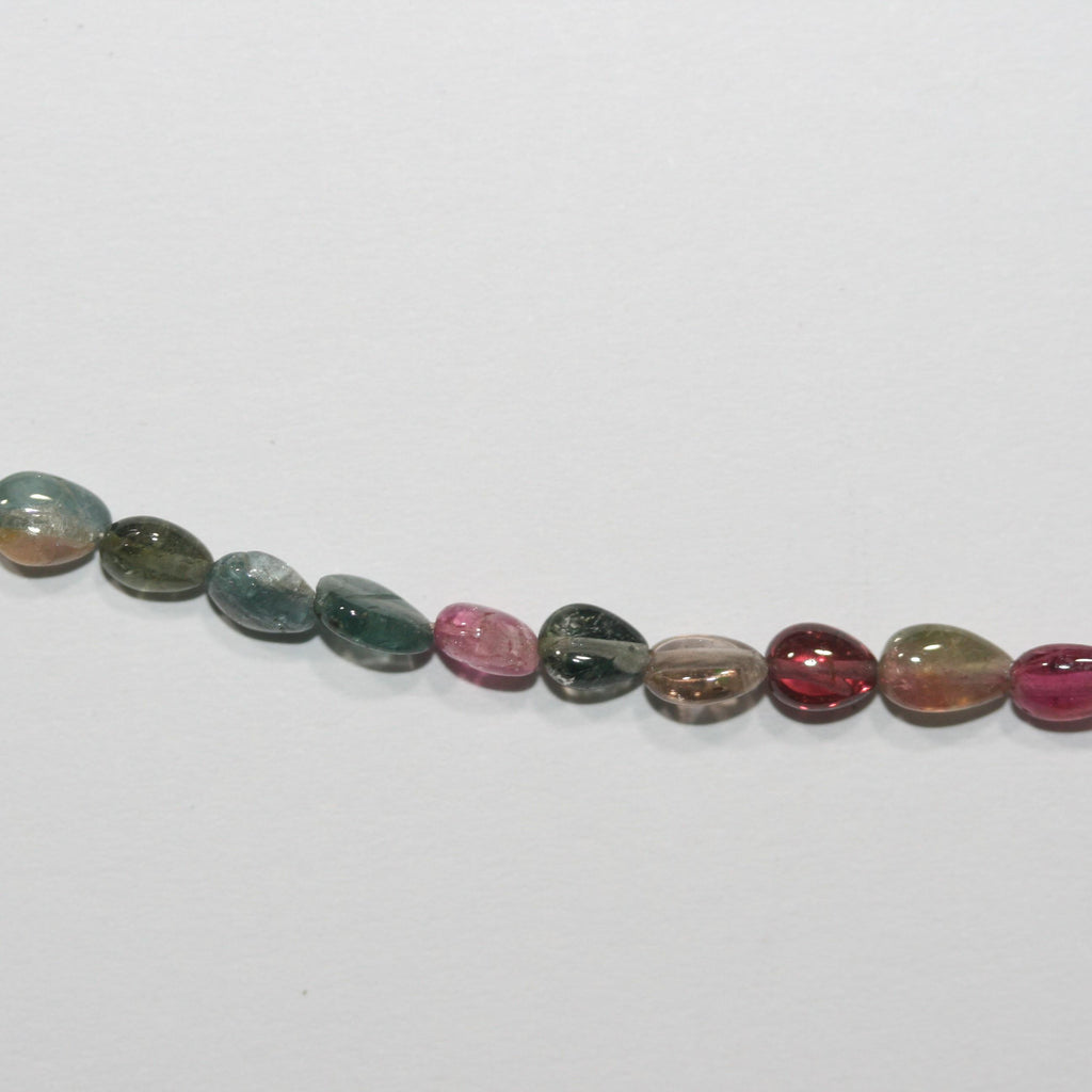 Perles en tourmaline lisses en forme de goutte de 8 pouces (environ 7 x 5 mm). Longueur du fil : 20 cm.