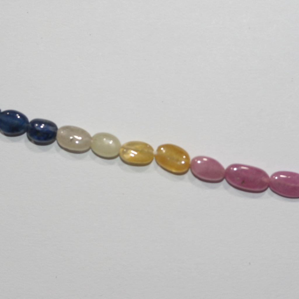 Cuentas ovaladas lisas de zafiro multicapa de 16" (7 x 5 mm). Longitud aproximada: 40 cm.