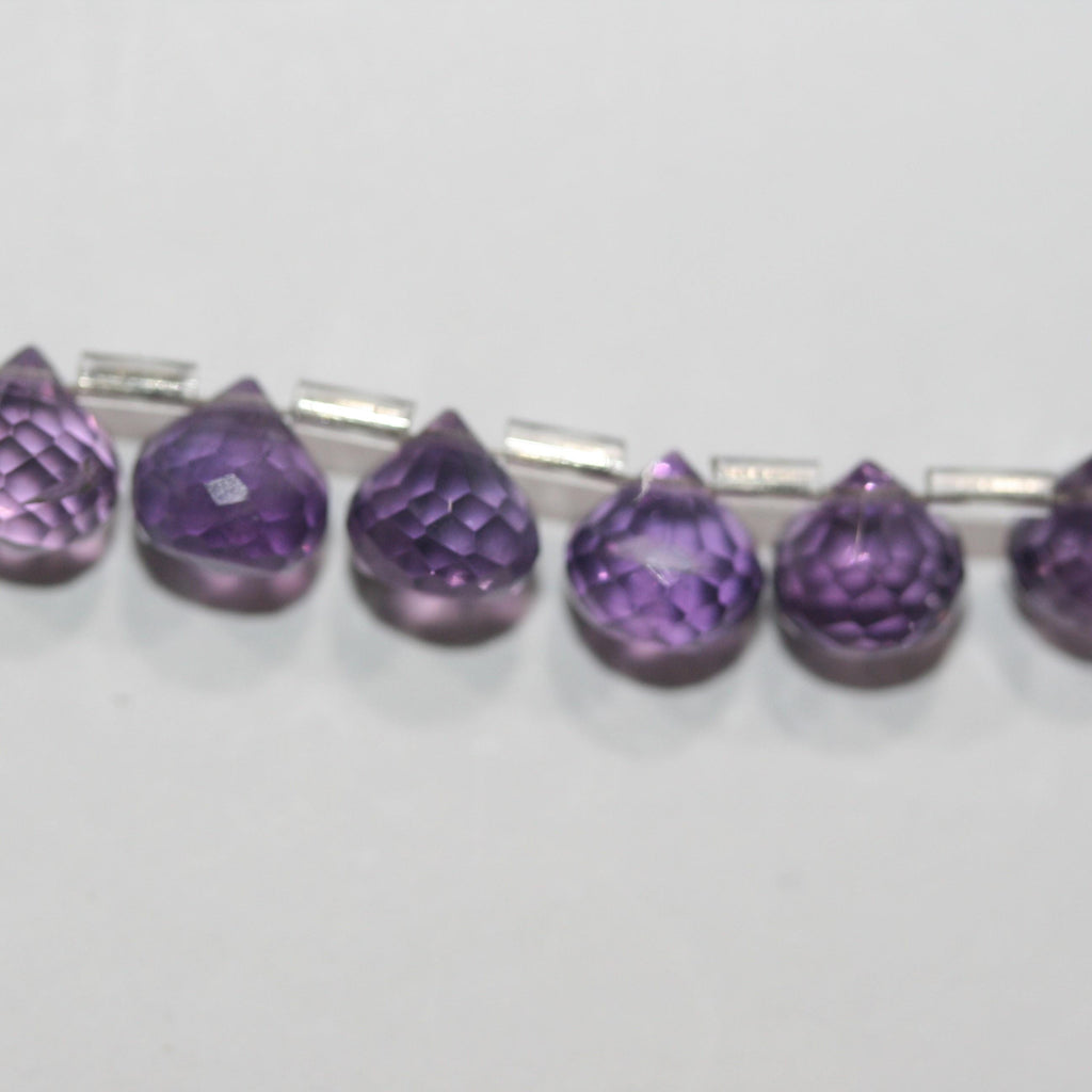 Cuentas de amatista facetadas de 8" (8-9 mm). Hilo de 20 cm aprox.