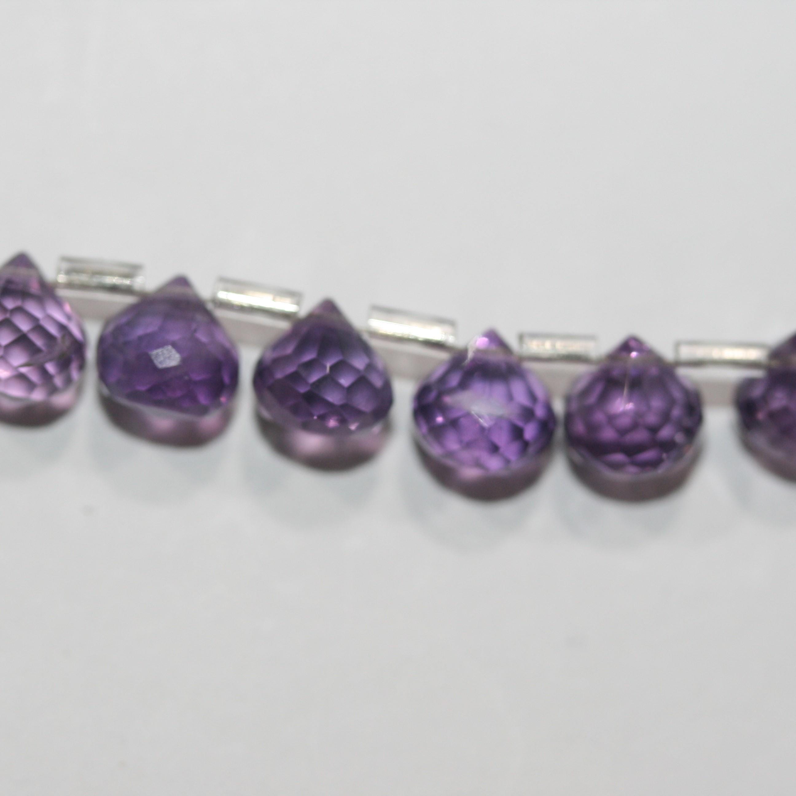 Cuentas de amatista facetadas de 8" (8-9 mm). Hilo de 20 cm aprox.