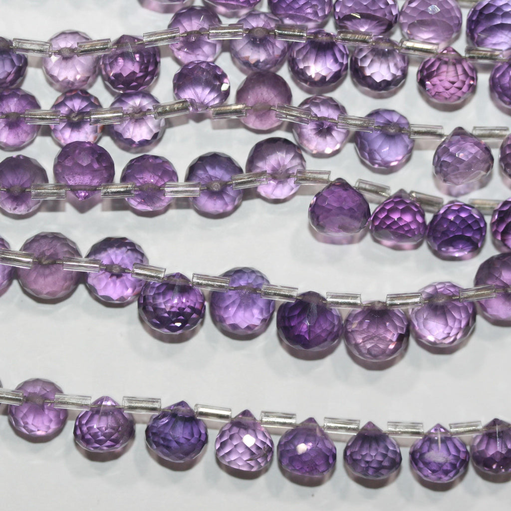 Cuentas de amatista facetadas de 8" (8-9 mm). Hilo de 20 cm aprox.