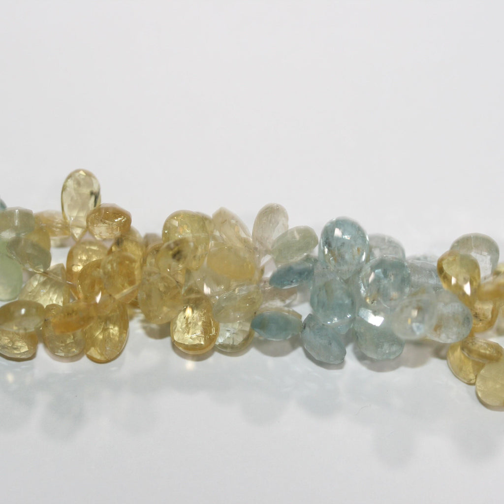 Cuentas facetadas de aguamarina y heliodoro de 8" (8 x 6 mm). Aprox. - Hilo de 20 cm. - Artículo 14986