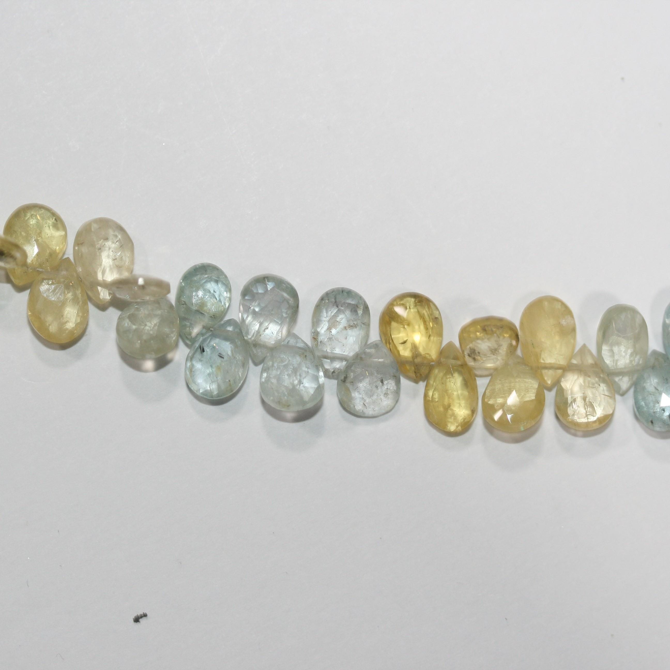 Cuentas facetadas de aguamarina y heliodoro de 8" (8 x 6 mm). Aprox. - Hilo de 20 cm. - Artículo 14986