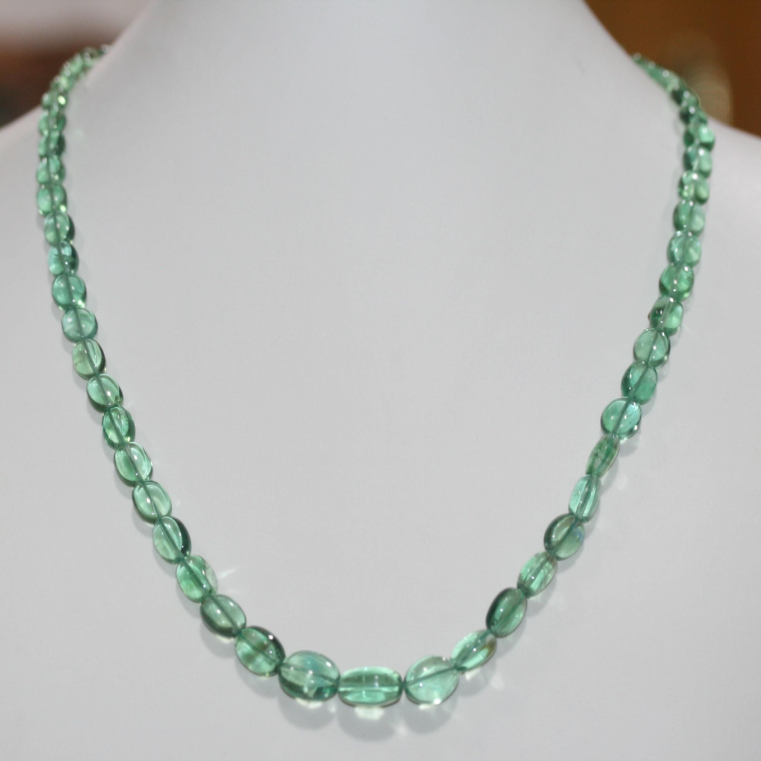 Collier ovale lisse dégradé en fluorite verte, dimensions approximatives : 12 x 10 - 7,5 x 6 mm (1 rang : 40 cm) - Réf. 15075