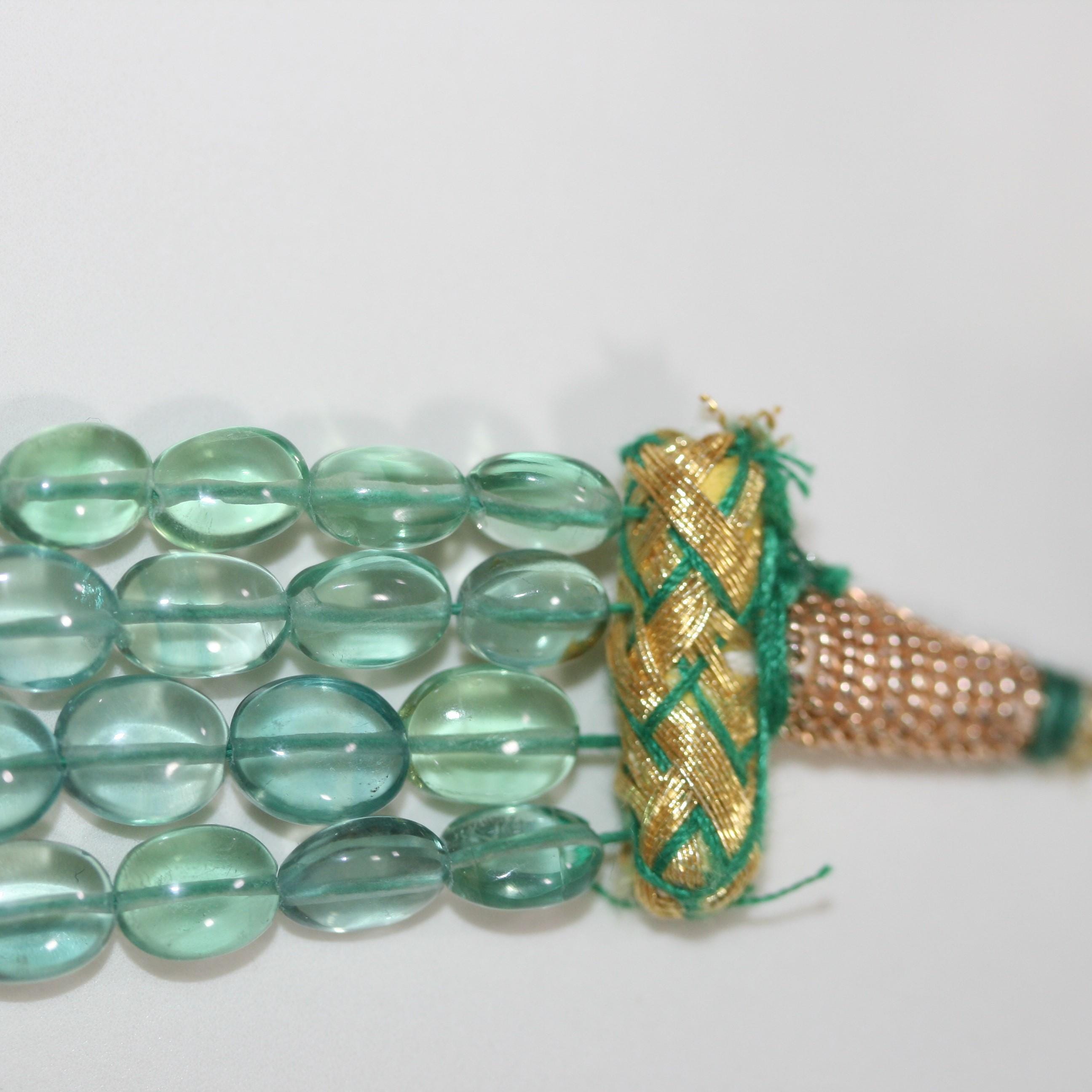 Collier ovale lisse dégradé en fluorite verte, 11 x 9 à 7 x 5 mm environ (4 rangs) - Réf. 15073