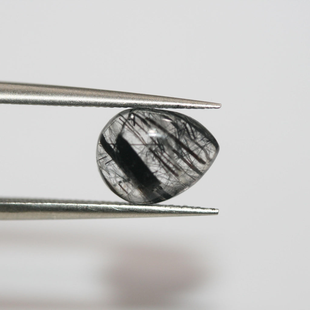 Lote de 8 cabujones lisos de cuarzo turmalinado de 10 x 8 mm (8 unidades). Artículo 1780CB