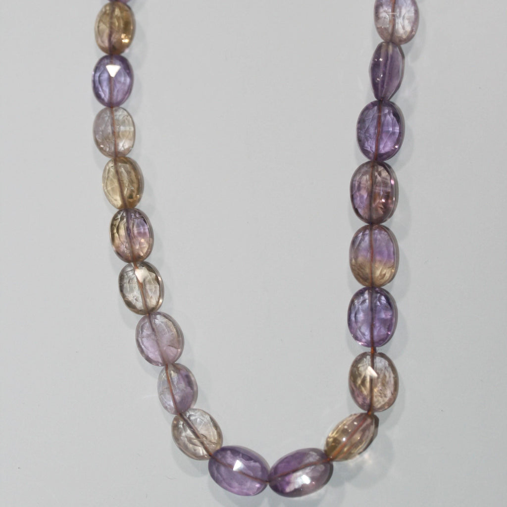Cuentas de amatista facetadas ovaladas graduadas de 16" (11 x 9 x 6 x 5 mm) - Hilo de 40 cm - Artículo 15052