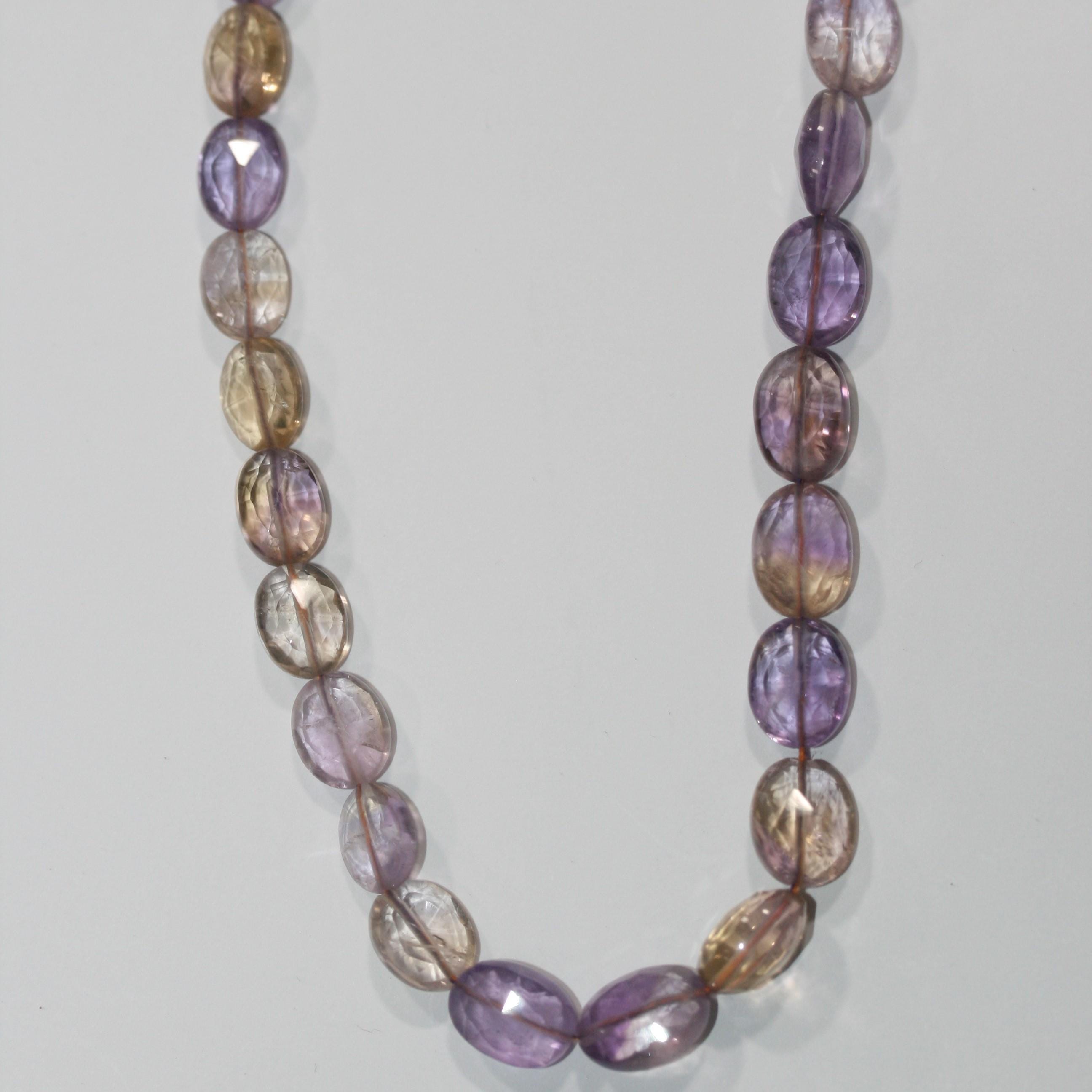 Cuentas de amatista facetadas ovaladas graduadas de 16" (11 x 9 x 6 x 5 mm) - Hilo de 40 cm - Artículo 15052