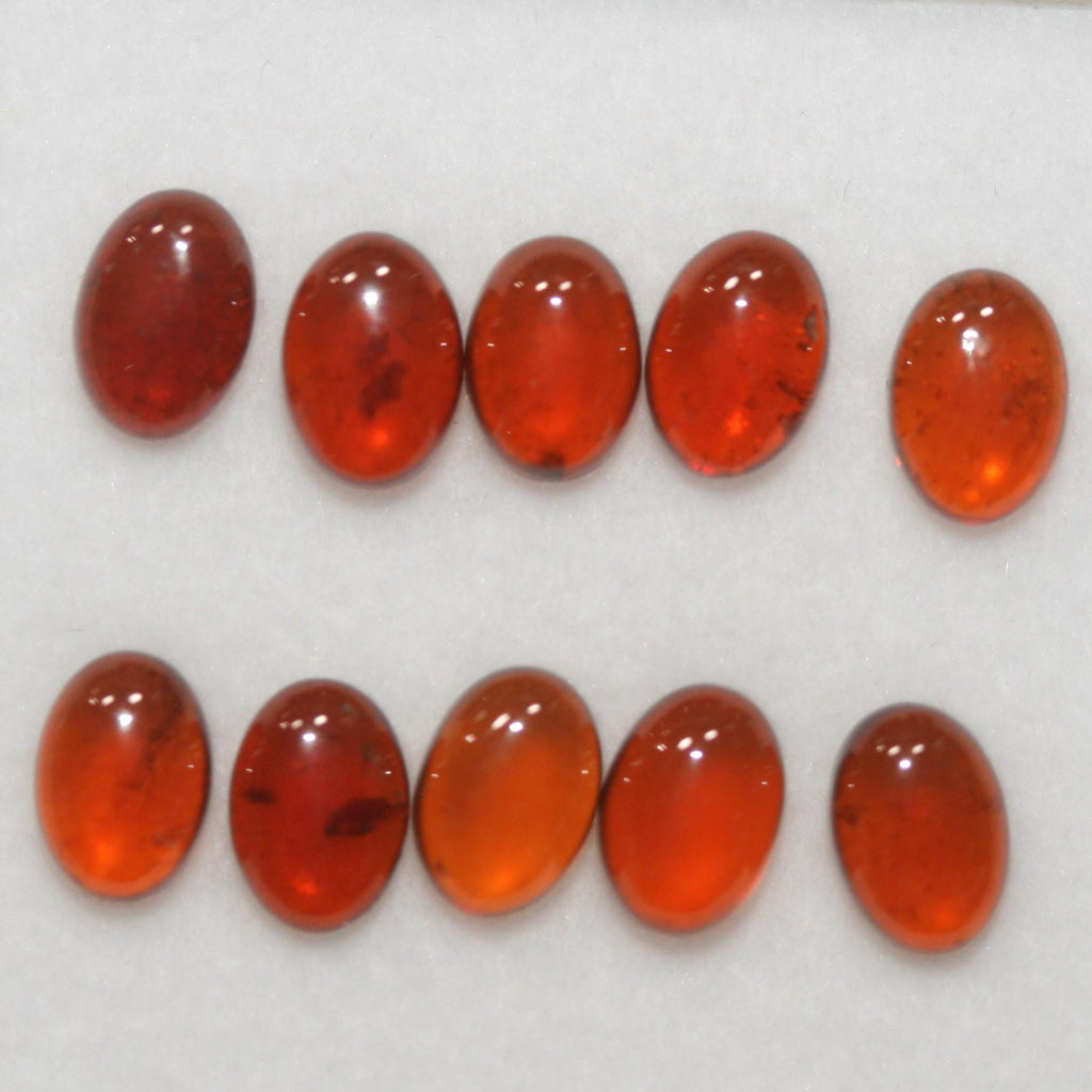 Hessonite Garnet Smooth Oval Cabochon 7x5mm. (10 Pcs).- Item.1755CB