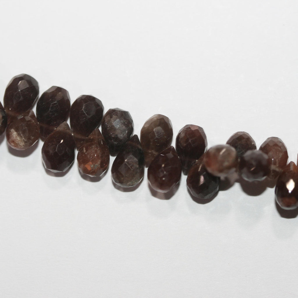 Cuentas de piedra lunar marrón facetadas de 8" (9 x 6 mm). Aprox. - Hilo de 20 cm.