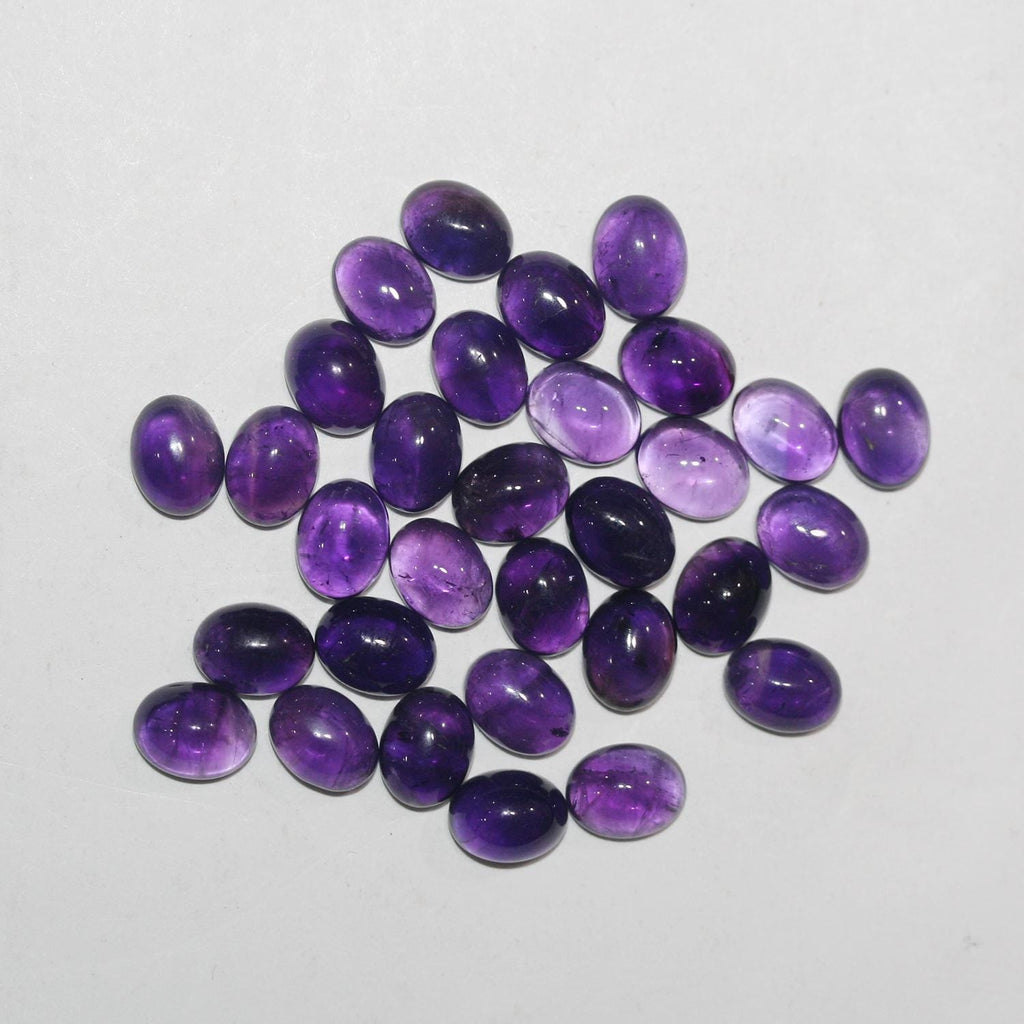 12 Pcs Lot Amethyst Oval Cabochon 9x7mm. (12 pcs.)