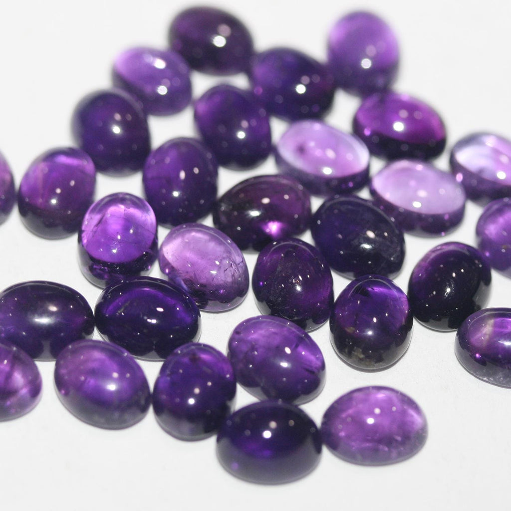 12 Pcs Lot Amethyst Oval Cabochon 9x7mm. (12 pcs.)