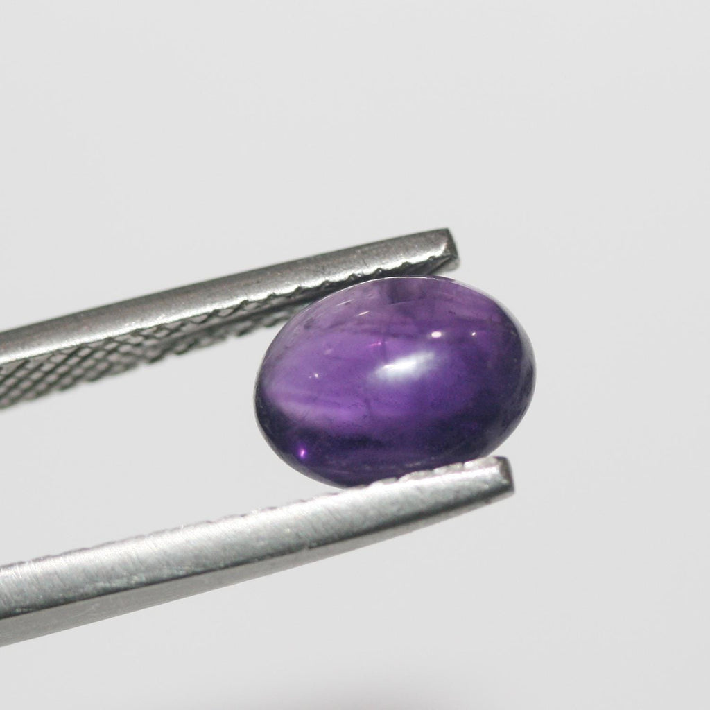 12 Pcs Lot Amethyst Oval Cabochon 9x7mm. (12 pcs.)