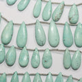 Perles plates lisses en turquoise St de 8 pouces (18 x 8 mm). Longueur du fil : environ 20 cm.