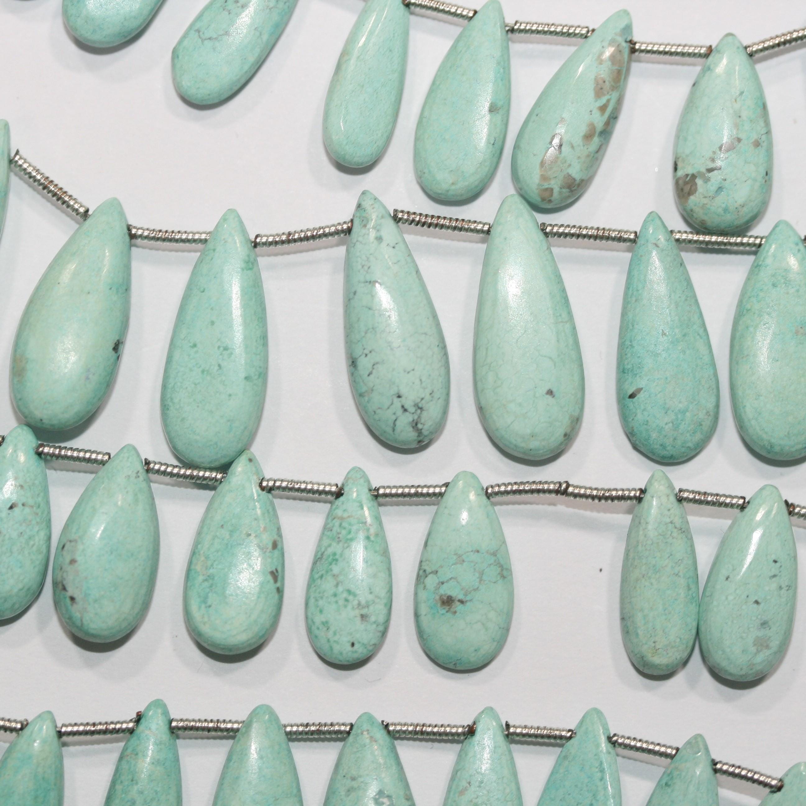 Perles plates lisses en turquoise St de 8 pouces (18 x 8 mm). Longueur du fil : environ 20 cm.