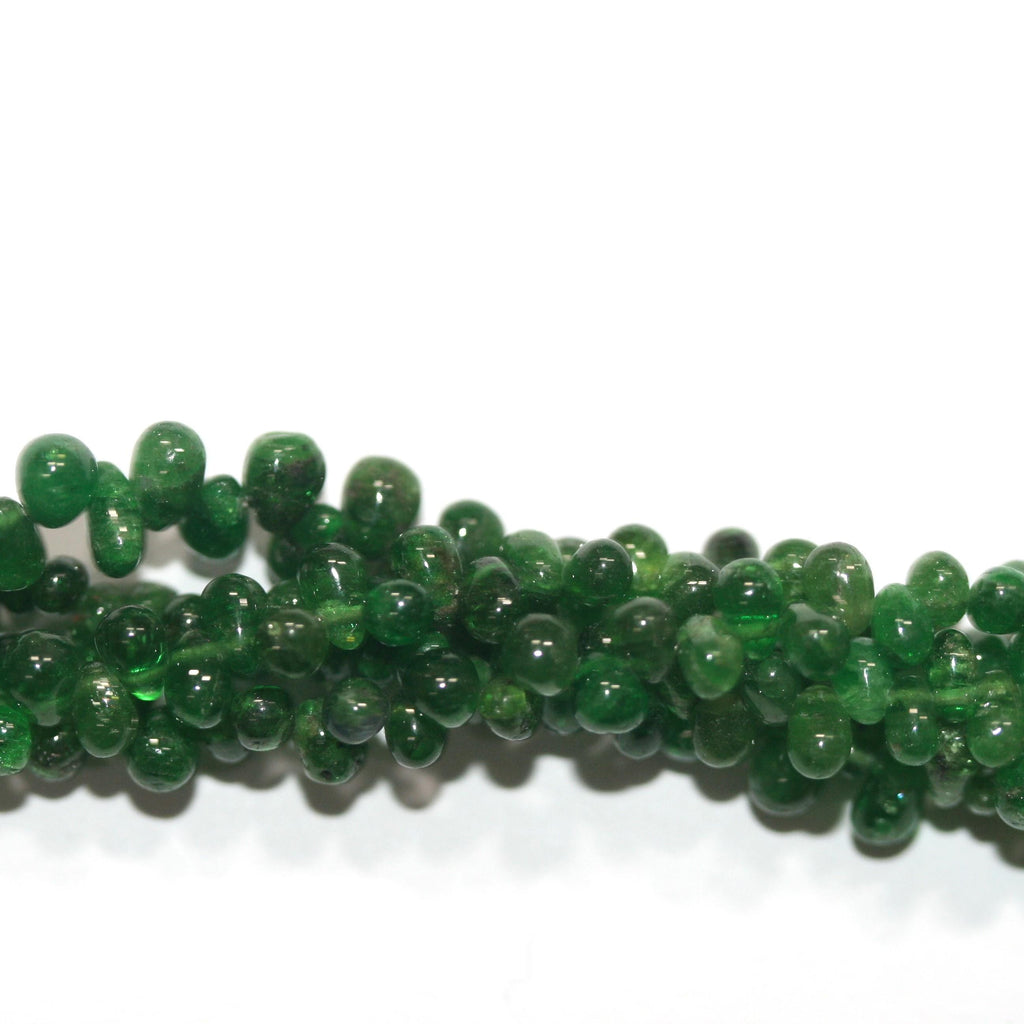 Perles en grenat tsavorite St lisses en forme de goutte, 4 x 3 mm environ - Longueur du fil : 20 cm.