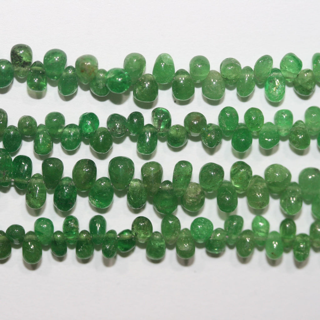 Perles en grenat tsavorite St lisses en forme de goutte, 4 x 3 mm environ - Longueur du fil : 20 cm.