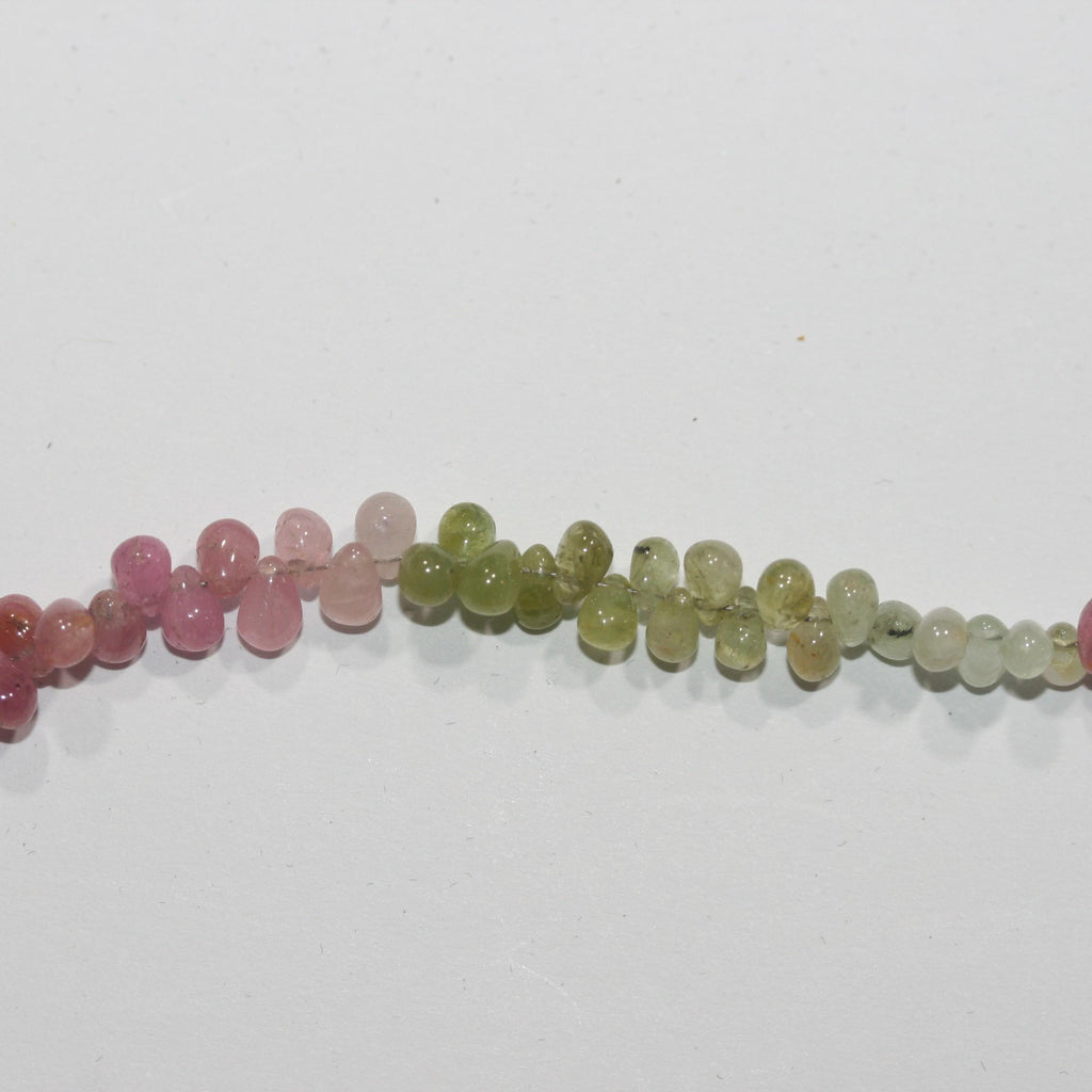 Perles en forme de goutte facettées en saphir rose-vert de 8 pouces (environ 6 x 4 mm) - Longueur du fil : 20 cm.